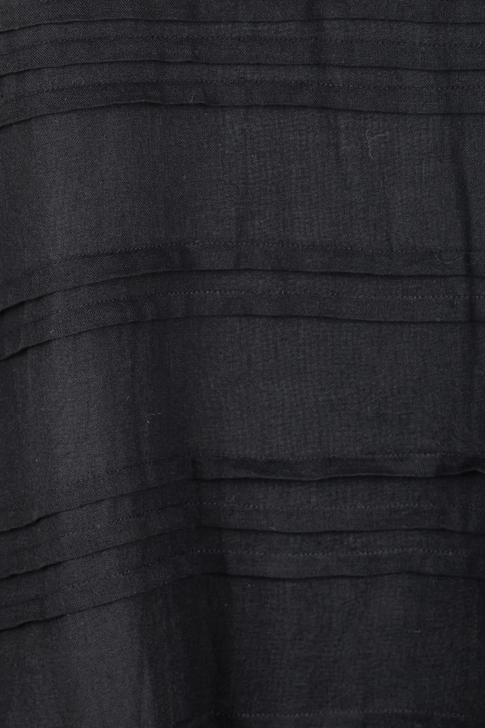 Product shot of the Essentials Pleated Cotton Dress - Black in colour Black, showing detail