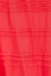Product shot of the Essentials Pleated Cotton Dress - Red in colour Red, showing detail