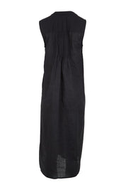 Product shot of the Essentials Pleated Cotton Dress - Black in colour Black, from the back