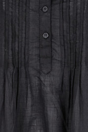 Product shot of the Essentials Pleated Cotton Dress - Black in colour Black, showing detail