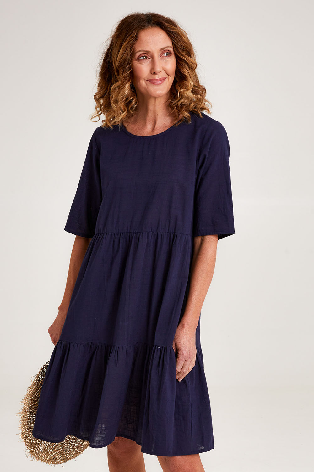 Model Emma wearing size 10 of the Essentials Organic Cotton Layers Slub Dress in colour Navy (Blue), from the front, cropped image