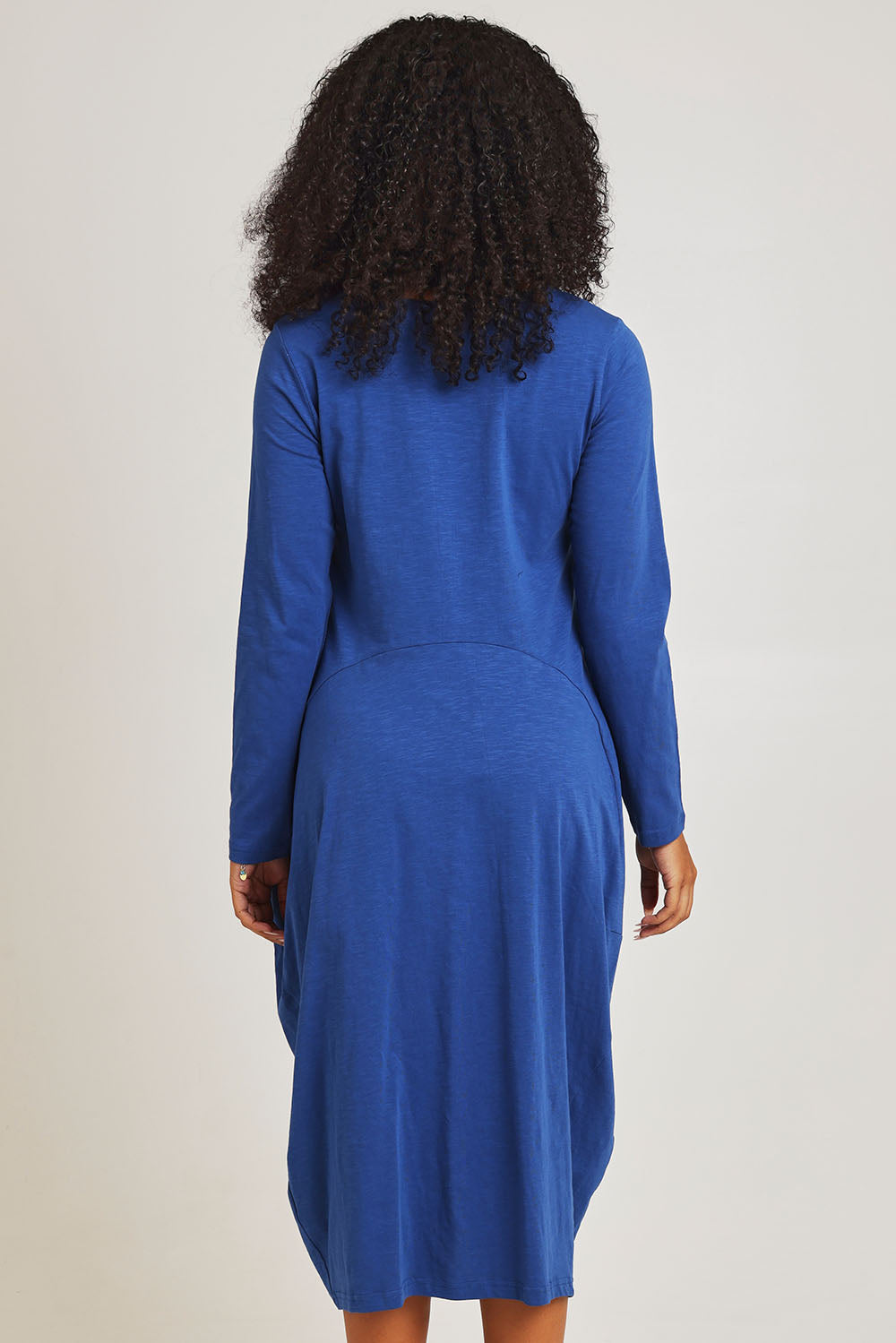 Model Ziara wearing size 10 of the Cotton Blend Bubble Dress in colour Blue (Blue), from the back