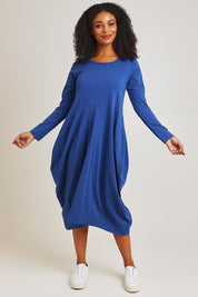 Model Ziara wearing size 10 of the Cotton Blend Bubble Dress in colour Blue (Blue), from the front, showing the whole outfit