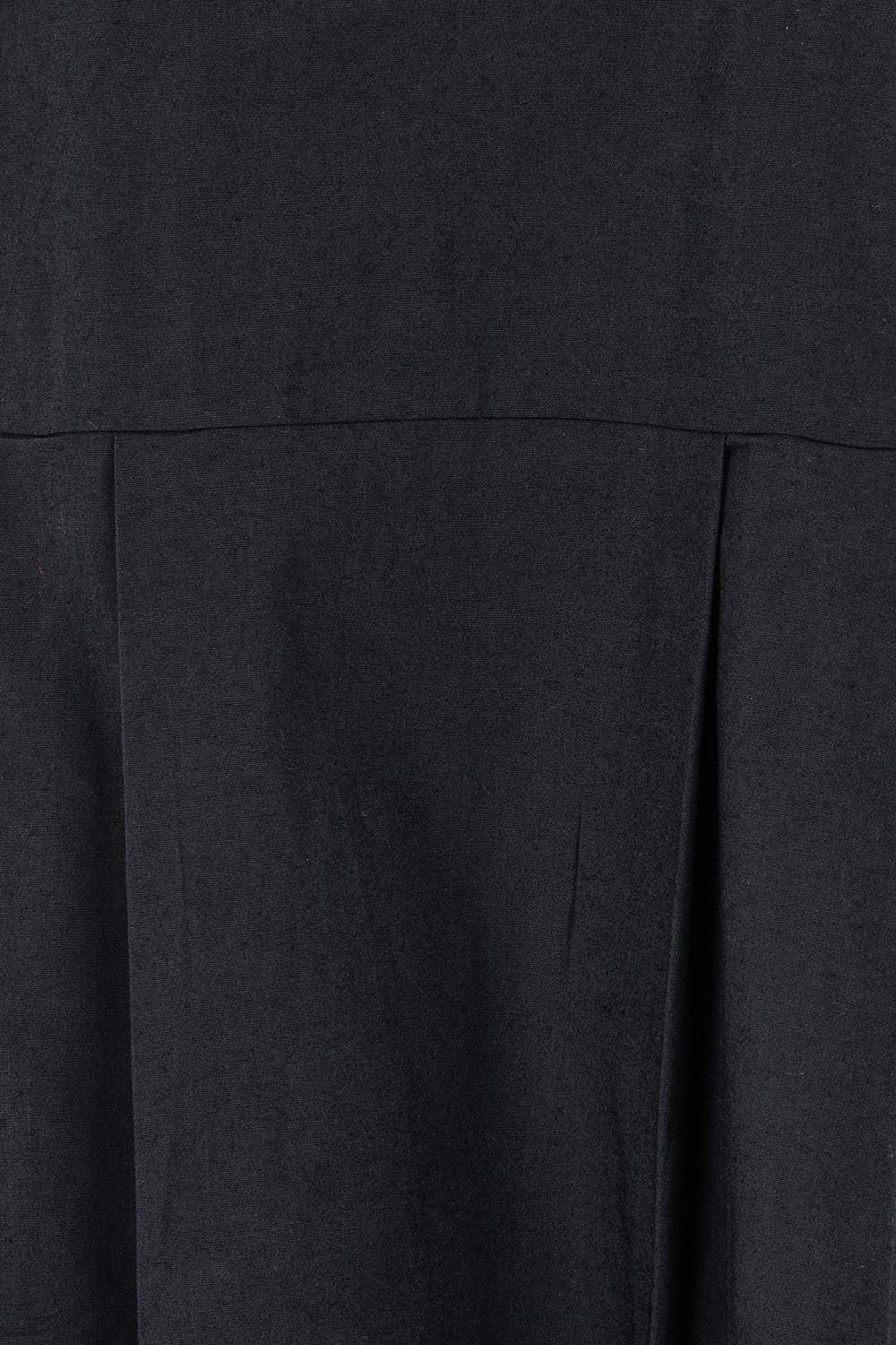 Product shot of the Essentials Pleated Cotton Dress in colour Black (Black), detail