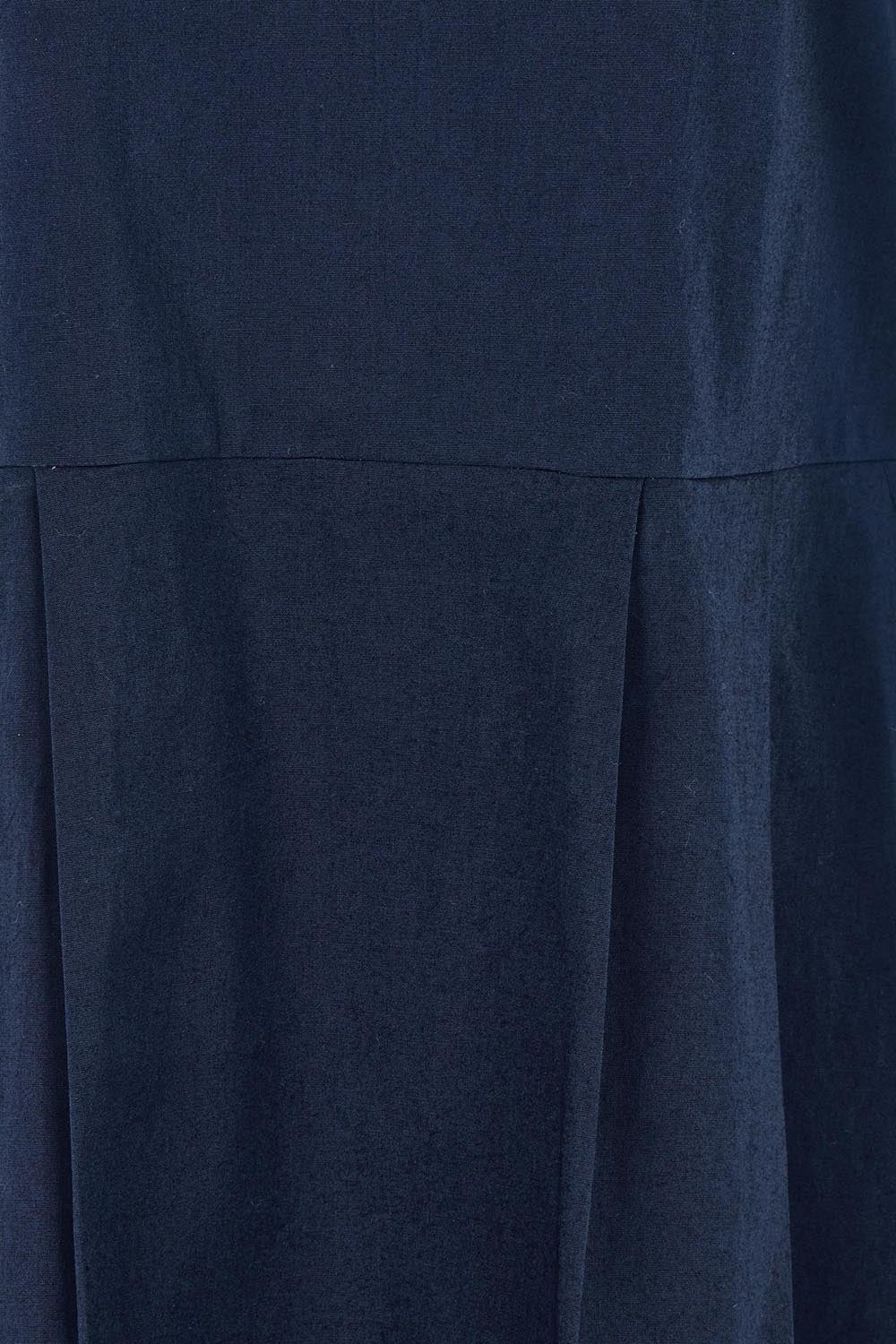 Product shot of the Essentials Pleated Cotton Dress in colour Navy (Blue), detail