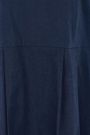Product shot of the Essentials Pleated Cotton Dress in colour Navy (Blue), detail