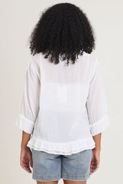 Model Ziara wearing size 10 of the Essentials Buttonthrough Cotton Top in colour White (White), from the back