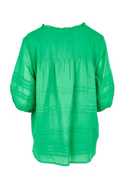 Product shot of the Essentials Pleated Cotton Top - Green in colour Green, from the back