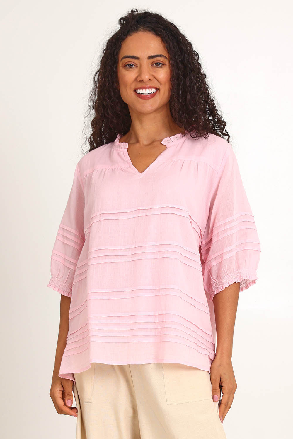 Model Pamelar wearing size 10 of the Essentials Pleated Cotton Top - Pink in colour Pink, in a cropped view