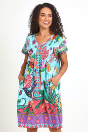 Model Pamelar wearing size 10 of the Essy Fit Dress – Print in colour Print, in a cropped view
