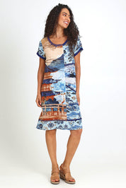 Model Pamelar wearing size 10 of the Patch Dress – Blue in colour Blue, from the front