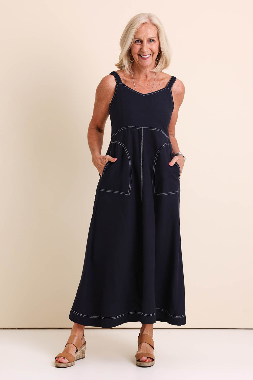 Model Sandys wearing size 10 of the Essentials Strappy Linen Blend Dress - Navy in colour Navy, from the front