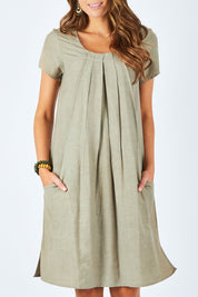 Model Madeline wearing size 10 of the Essential Sleeve Dress in colour Olive (Green), from the front, cropped image