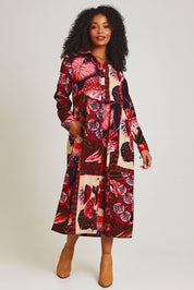 Model Ziara wearing size 10 of the Chandalier Cord Long Collar Dress in colour Chandalier (Red), from the front, showing the whole outfit