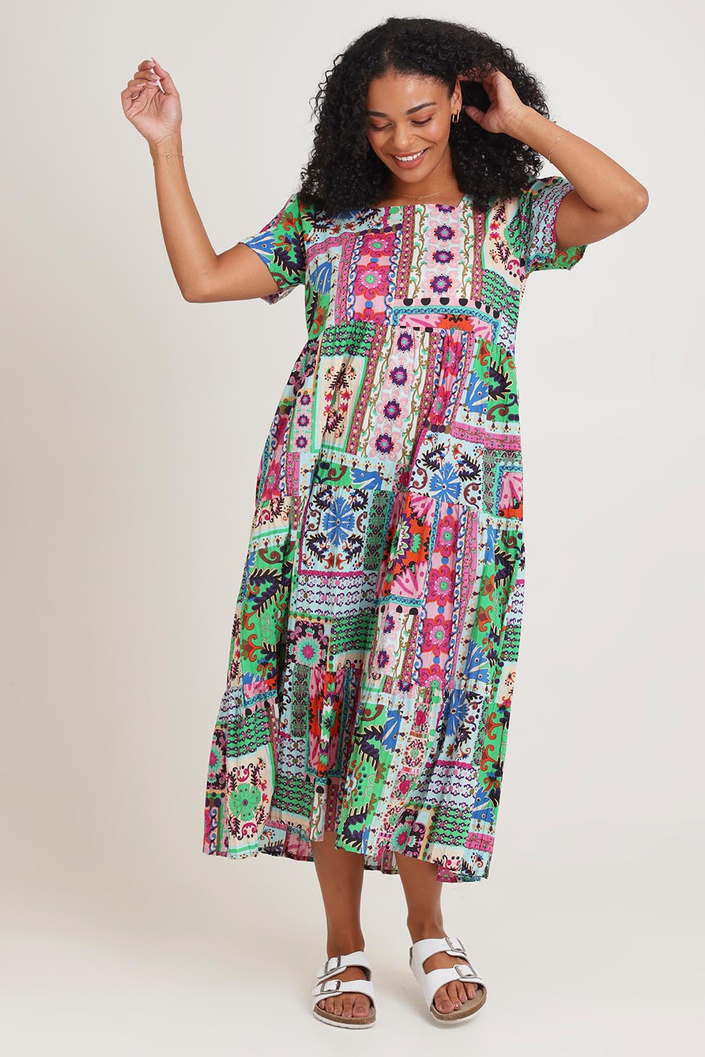 Model Ziara wearing size 10 of the Sao Bento Square Neckline Layers Cotton Dress in colour Print, from the front, showing the whole outfit