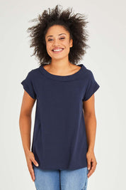 Model Olivia wearing size 10 of the Essentials Linen Blend Folded Neckline Top in colour Navy (Blue), from the front, cropped image