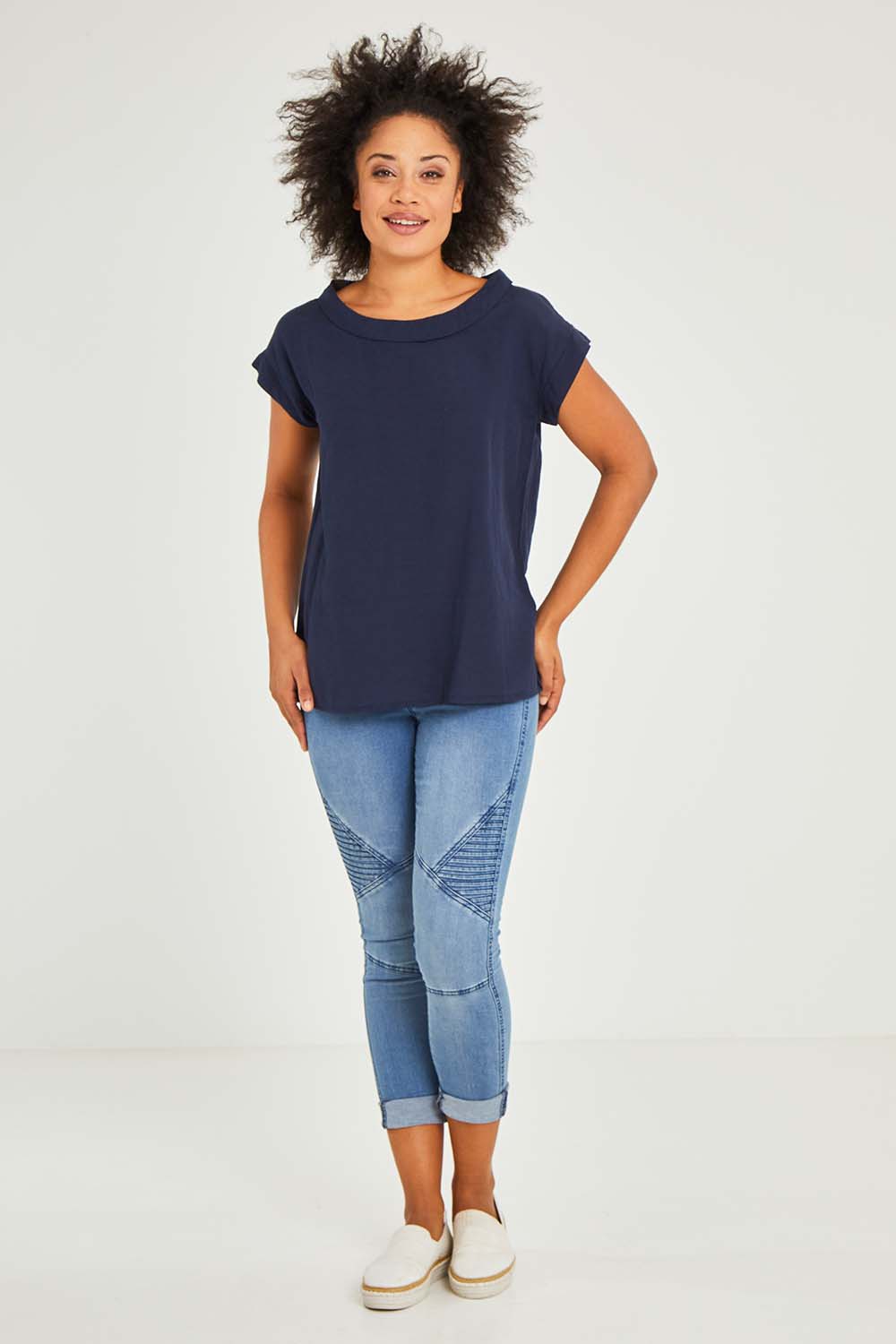 Model Olivia wearing size 10 of the Essentials Linen Blend Folded Neckline Top in colour Navy (Blue), from the front, showing the whole outfit