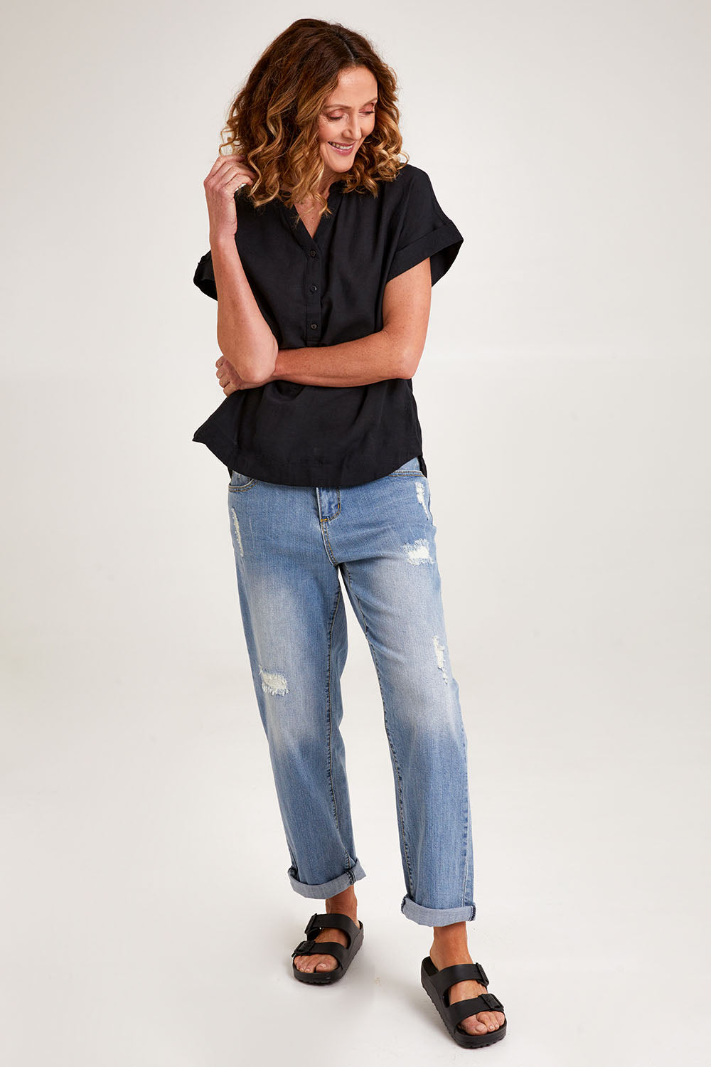 Model Emma wearing size 10 of the Essentials Linen Blend Manderin Collar Top in colour Black (Black), from the front, showing the whole outfit