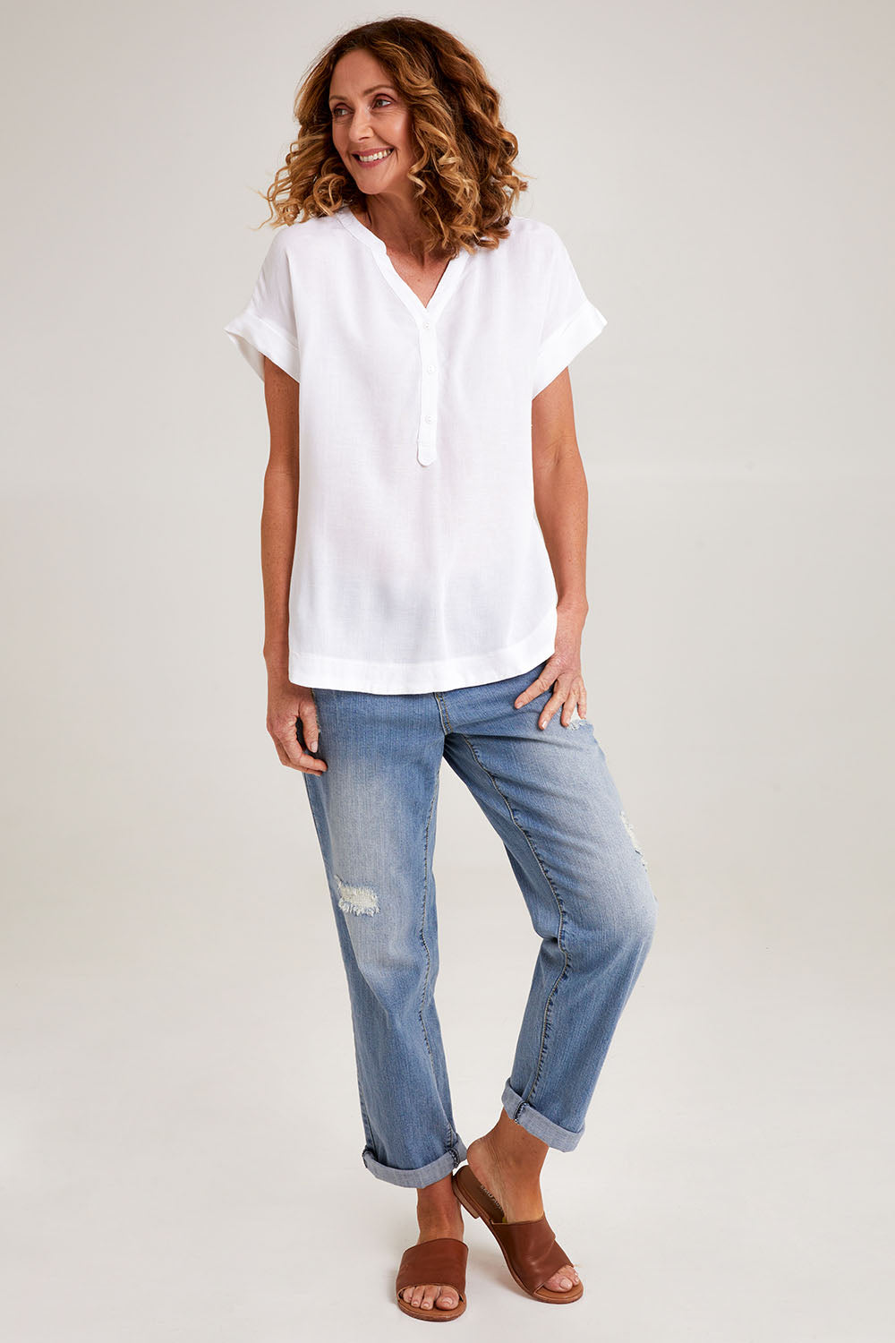Model Emma wearing size 10 of the Essentials Linen Blend Manderin Collar Top in colour White (White), from the front, showing the whole outfit