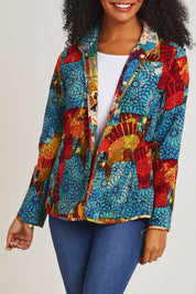Model Ziara wearing size 10 of the Billie Jean Reversible Jacket in colour Billiejean, from the front, cropped image
