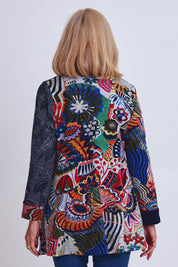 Model Sandy wearing size 10 of the Hotel California Patch Tunic Top in colour California (Blue), from the back