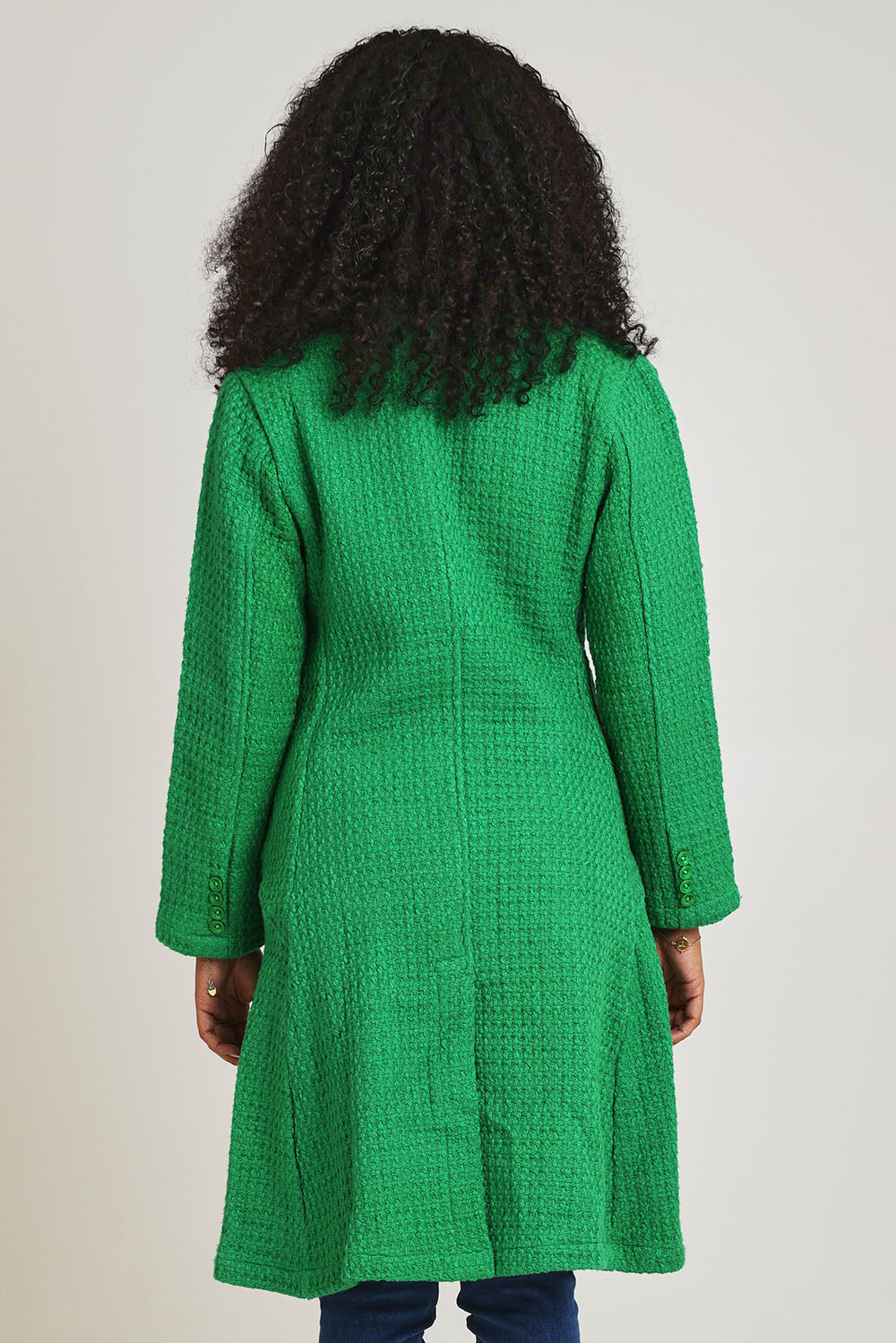 Model Ziara wearing size 10 of the Solid Cotton Long Coat in colour Green (Green), from the back