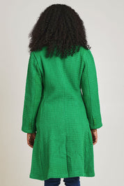 Model Ziara wearing size 10 of the Solid Cotton Long Coat in colour Green (Green), from the back