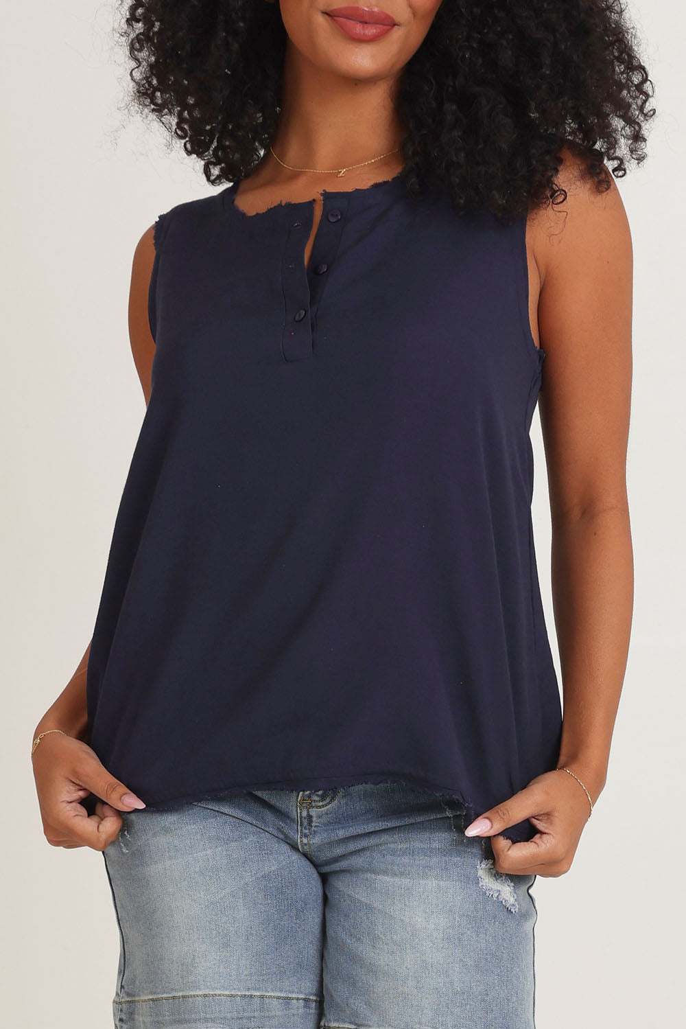 Model Ziara wearing size 10 of the Essentials Linen Blend Frill Top in colour Navy (Blue), from the front, cropped image