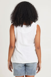 Model Ziara wearing size 10 of the Essentials Linen Blend Frill Top in colour White (White), from the back