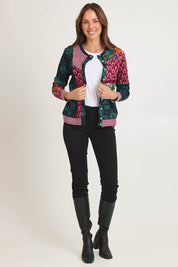 Model Madeline wearing size 10 of the Patch Cardigan in colour Prato, from the front, showing the whole outfit