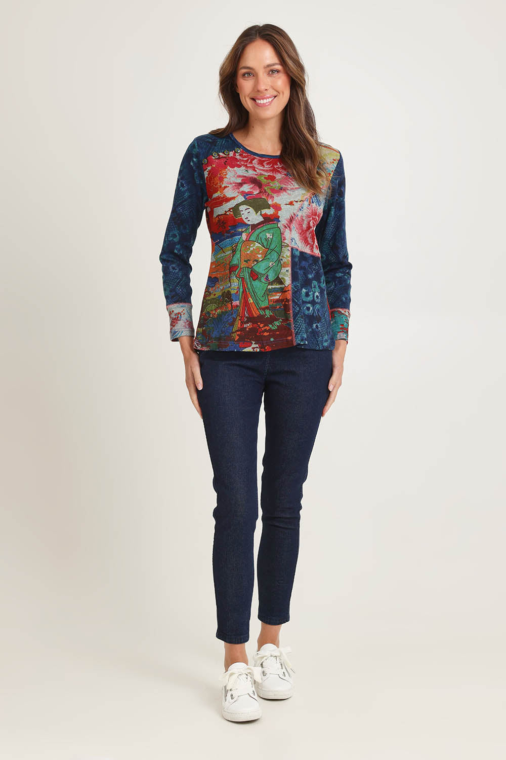 Model Madeline wearing size 10 of the Patch Top in colour Nippori (Blue), from the front, showing the whole outfit