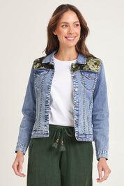 Model Madeline wearing size 10 of the Denim Jacket in colour Keqioa (Blue), from the front, cropped image