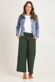 Model Madeline wearing size 10 of the Denim Jacket in colour Keqioa (Blue), from the front, showing the whole outfit