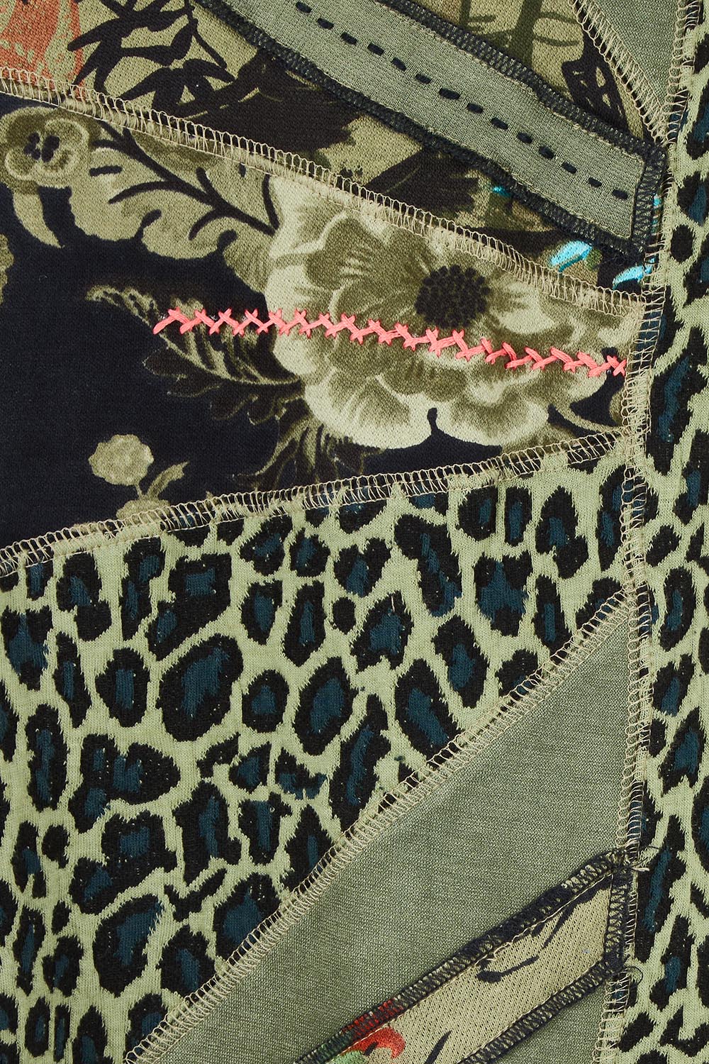 Product shot of the Patch Top in colour Keqioa (Green), detail