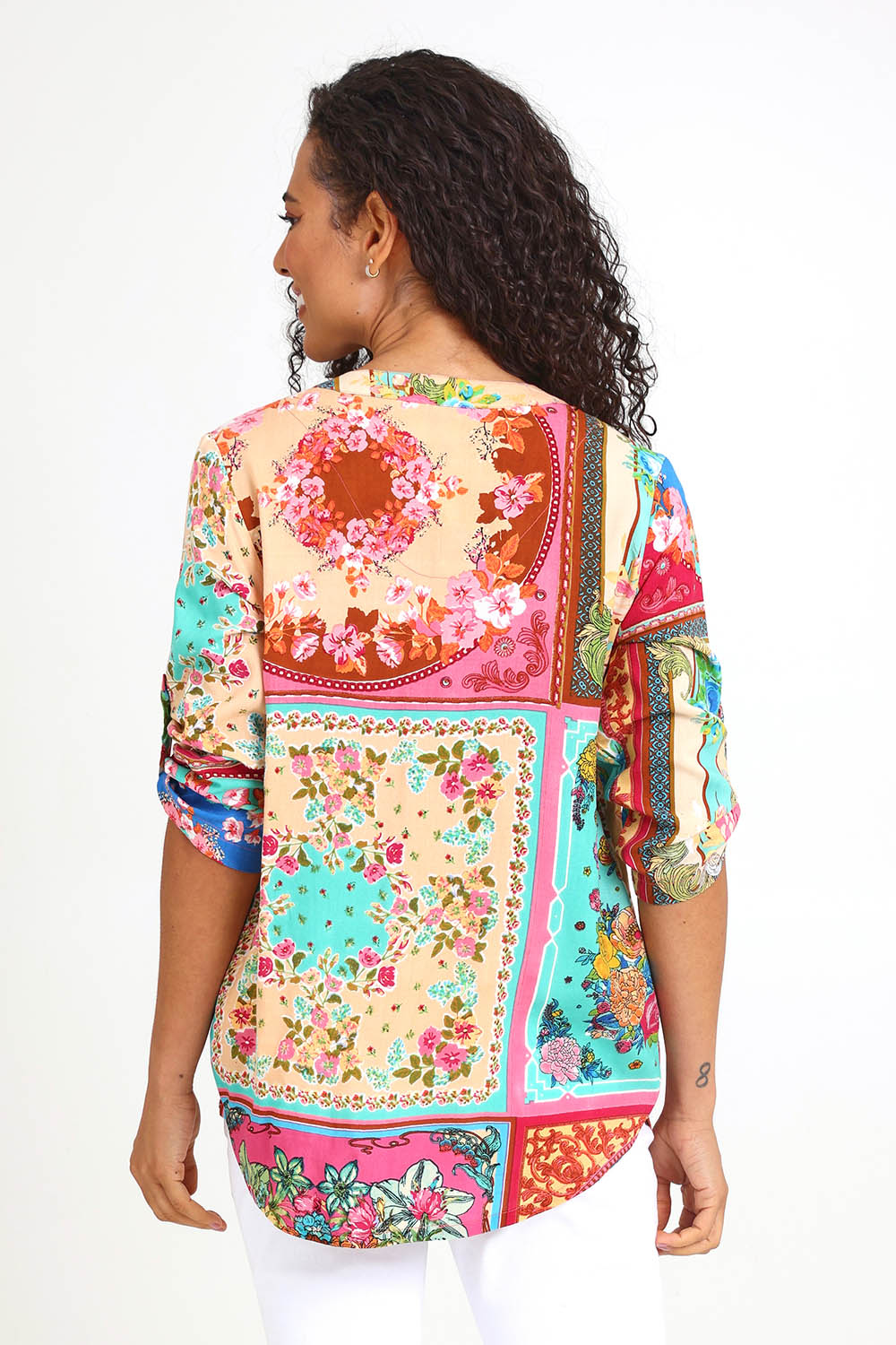 Model Pamelar wearing size 10 of the Pleated Top – Print in colour Print, from the back