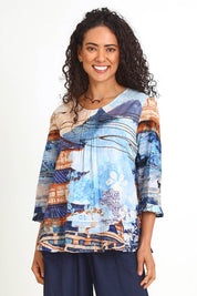 Model Pamelar wearing size 10 of the Pleated Top – Print in colour Print, in a cropped view