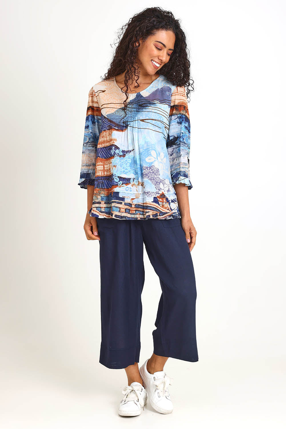 Model Pamelar wearing size 10 of the Pleated Top – Print in colour Print, from the front