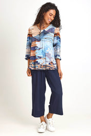 Model Pamelar wearing size 10 of the Pleated Top – Print in colour Print, from the front