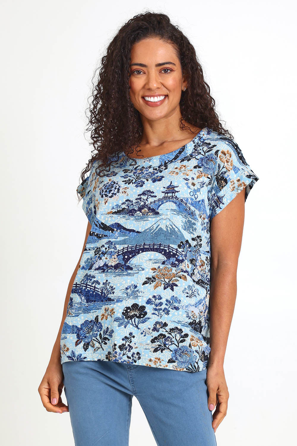 Model Pamelar wearing size 10 of the Rolled Neckline Top – Print in colour Print, in a cropped view