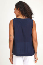 Model Pamelar wearing size 10 of the Essentials Linen Blend Cami - Navy in colour Navy, from the back