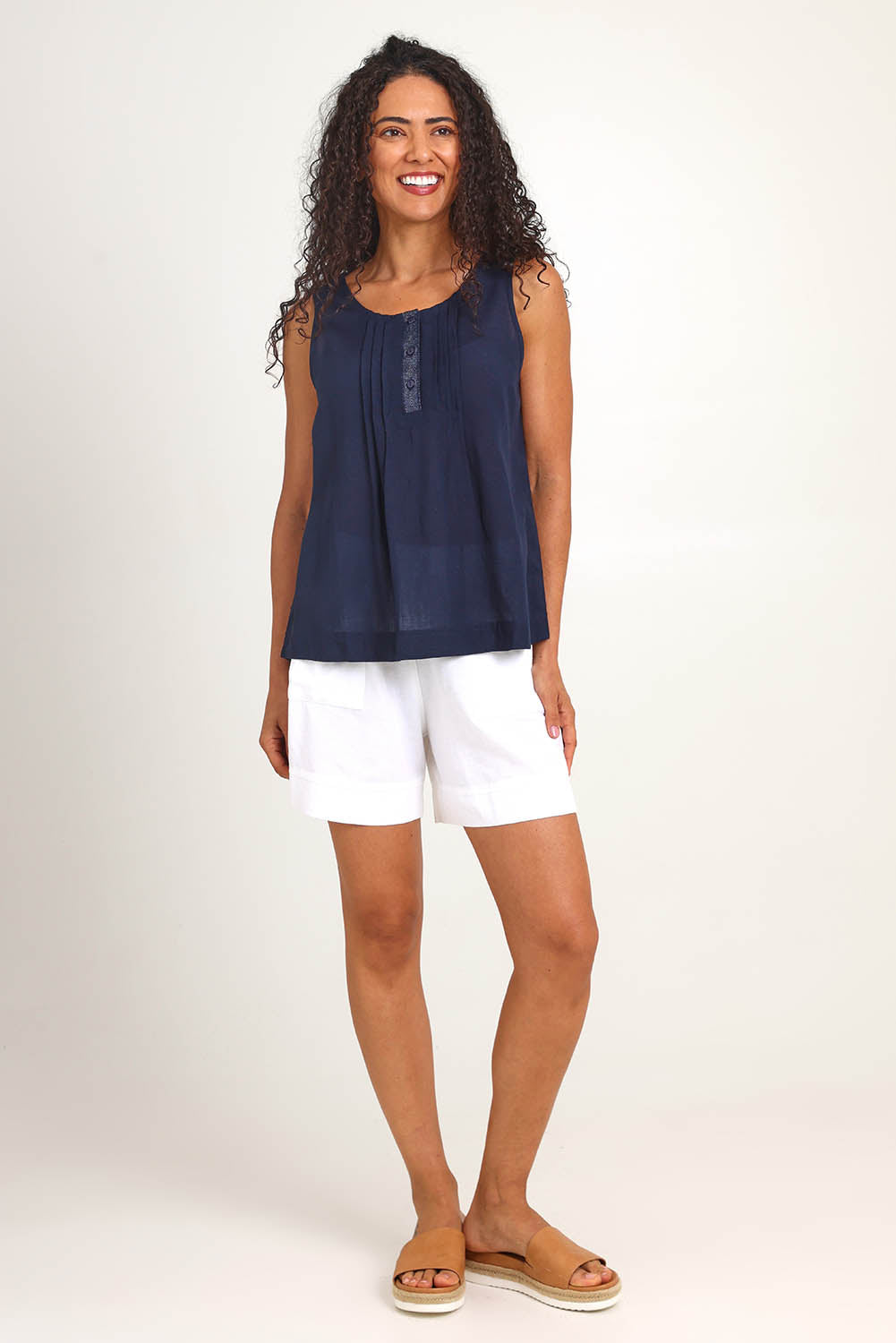 Model Pamelar wearing size 10 of the Essentials Linen Blend Cami - Navy in colour Navy, from the front