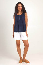 Model Pamelar wearing size 10 of the Essentials Linen Blend Cami - Navy in colour Navy, from the front