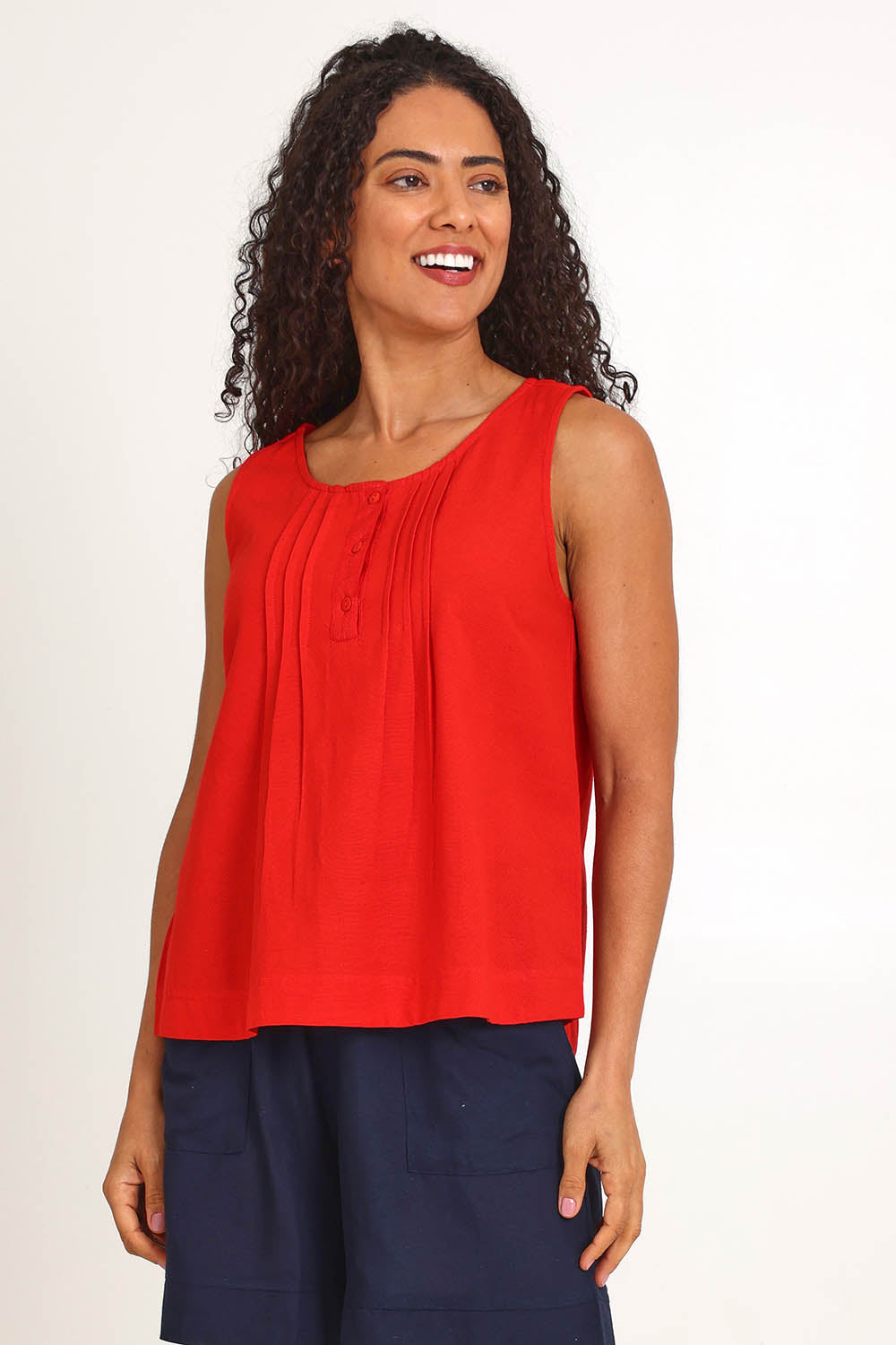 Model Pamelar wearing size 10 of the Essentials Linen Blend Cami - Red in colour Red, in a cropped view