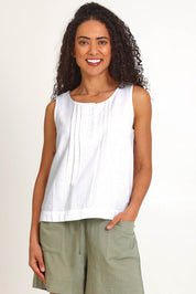 Model Pamelar wearing size 10 of the Essentials Linen Blend Cami - White in colour White, in a cropped view