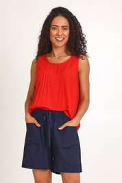 Model Pamelar wearing size 10 of the Essentials Linen Blend Shorts - Navy in colour Navy, in a cropped view