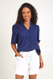 Model Pamelar wearing size 10 of the Essentials Linen Blend Shorts - White in colour White, in a cropped view