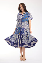 Model Genericm wearing size sample of the Long Patch Dress – Print in colour Print, from the front