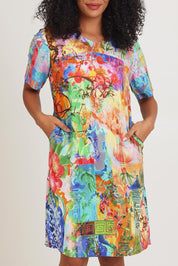 Model Ziara wearing size 10 of the Digital Shift Dress in colour Oriental, from the front, cropped image