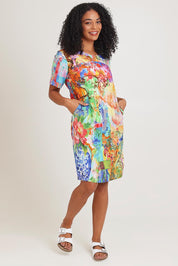 Model Ziara wearing size 10 of the Digital Shift Dress in colour Oriental, from the front, showing the whole outfit