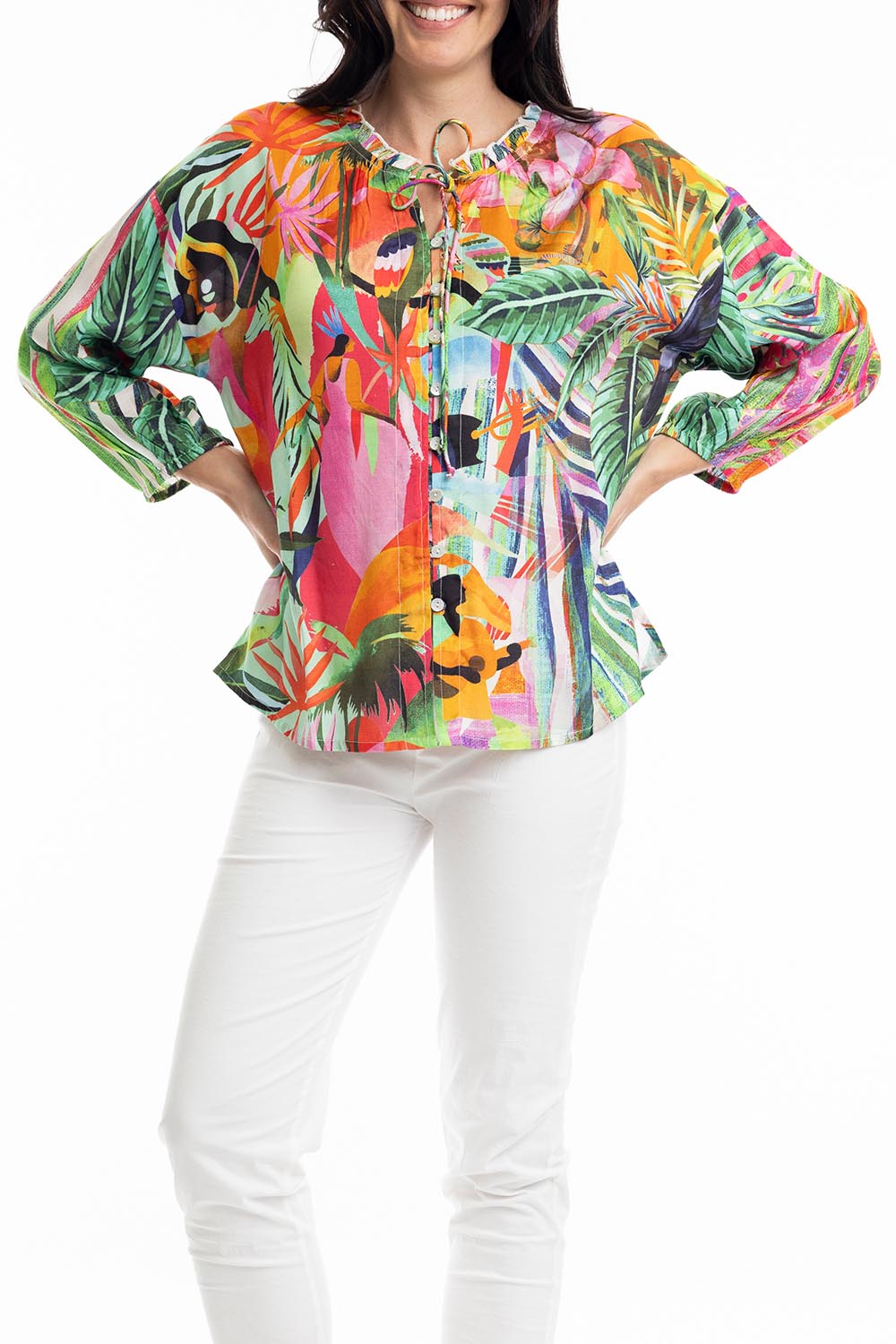 A model wearing the Rio Frill Neck Top in colour Rio (Green), from the front, cropped image